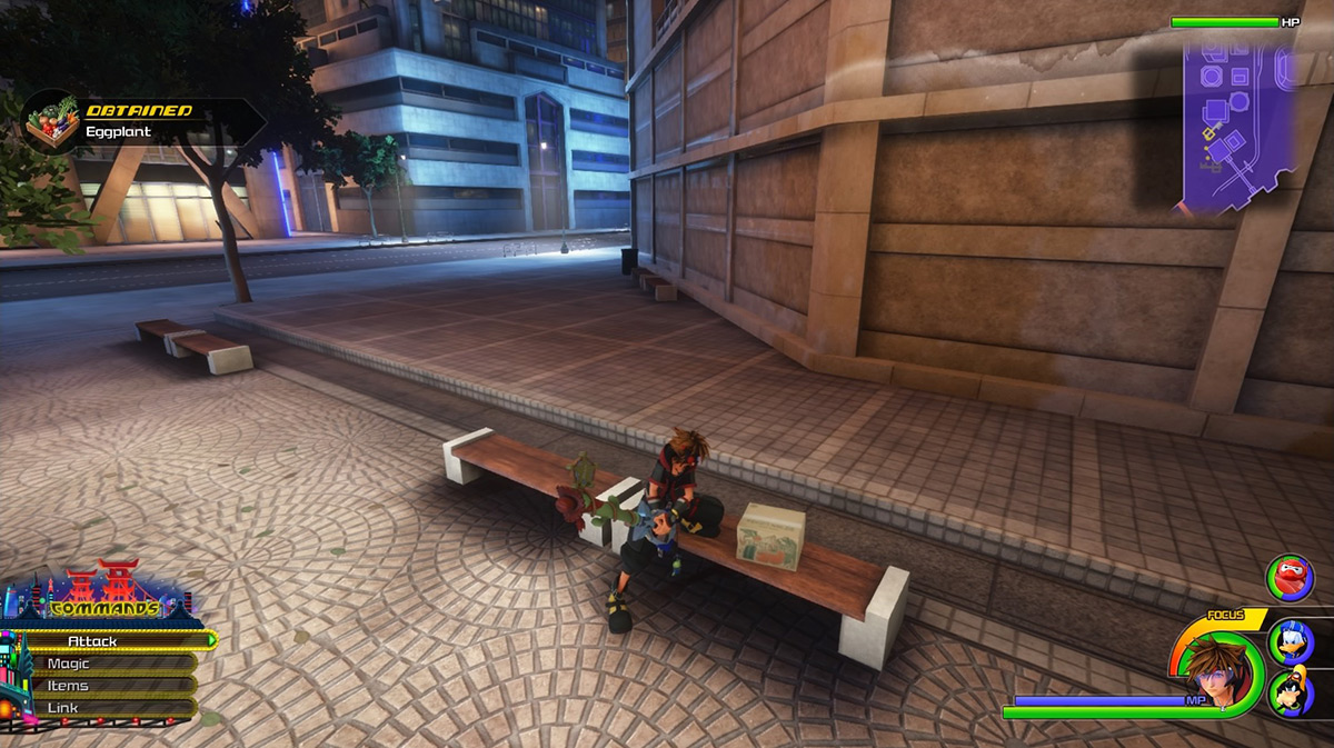 The vegetable box under the southwest building contains Eggplant / Kingdom Hearts 3