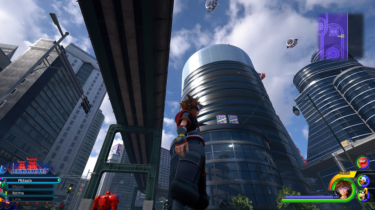 The fish-shaped fans float above the tall circular building / Kingdom Hearts 3